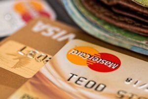 Image of gold mastercard credit card to support how retailers