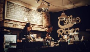 People behind the counter in a coffee shop