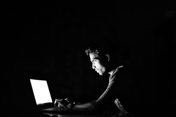 a hacker in the dark