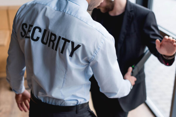 a security guard an a man