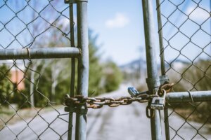 a gate that is locked with a chain lock