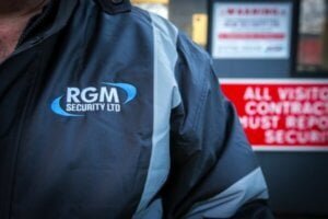 RGM Security Officer wearing security clothing with RGM Security logo emblazoned on the chest