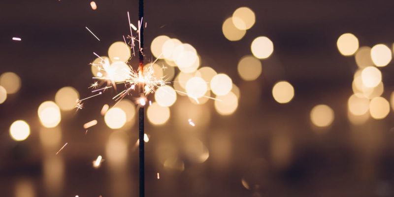 fireworks sparkler in the dark to represent security resolutions fro businesses for the new year