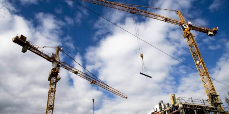 Construction site security with big large cranes in the background