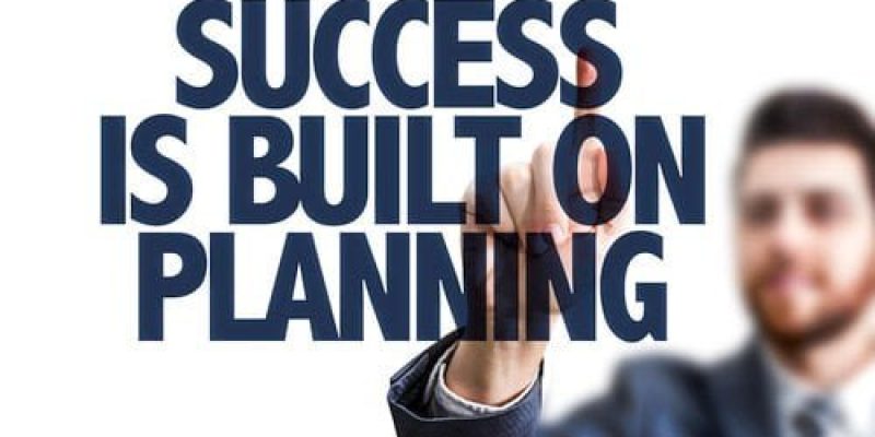 A man writing success is built on planning to support how to tips for running effective threat drills