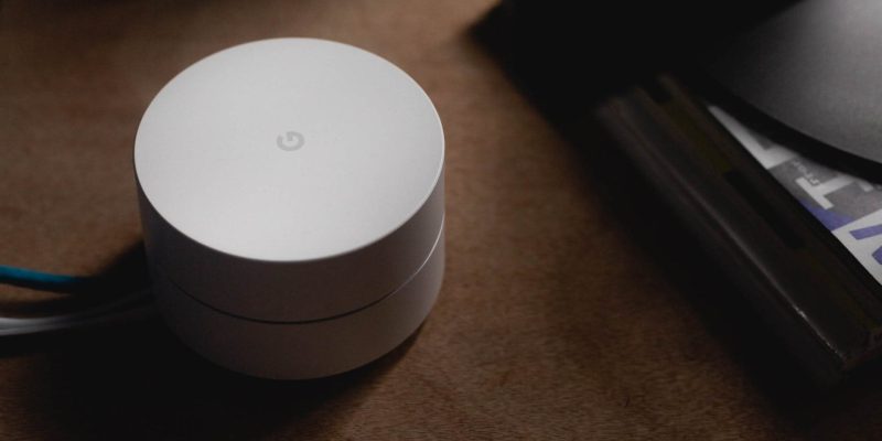 White Google Dot voice activated device which is susceptible to being hacked which can compromise your security